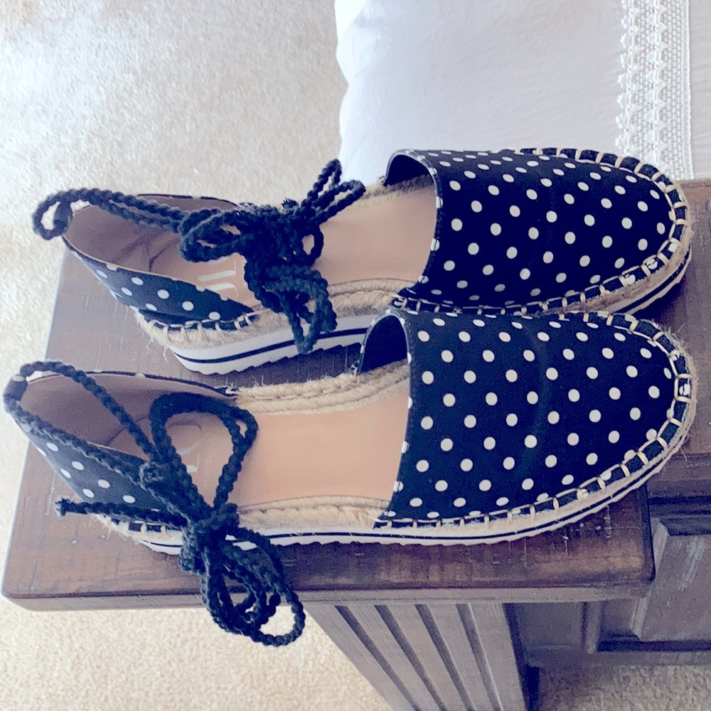 JLo polka dot black shoes.